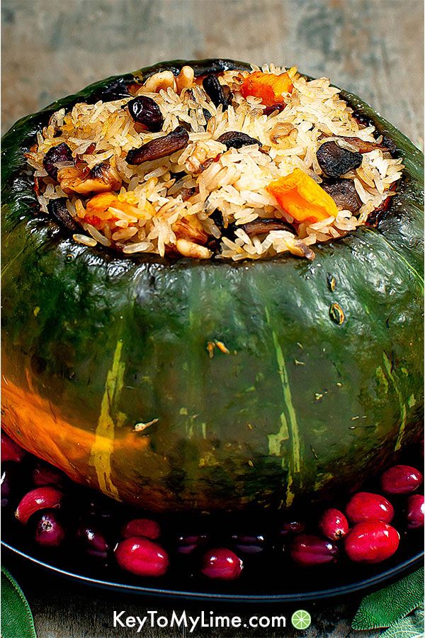 Roasted kabocha squash stuffed with rice, mushrooms, cranberries, and sage.