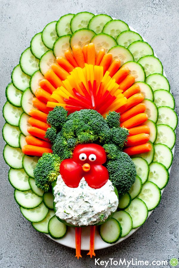 A turkey veggie platter with goat cheese dip.