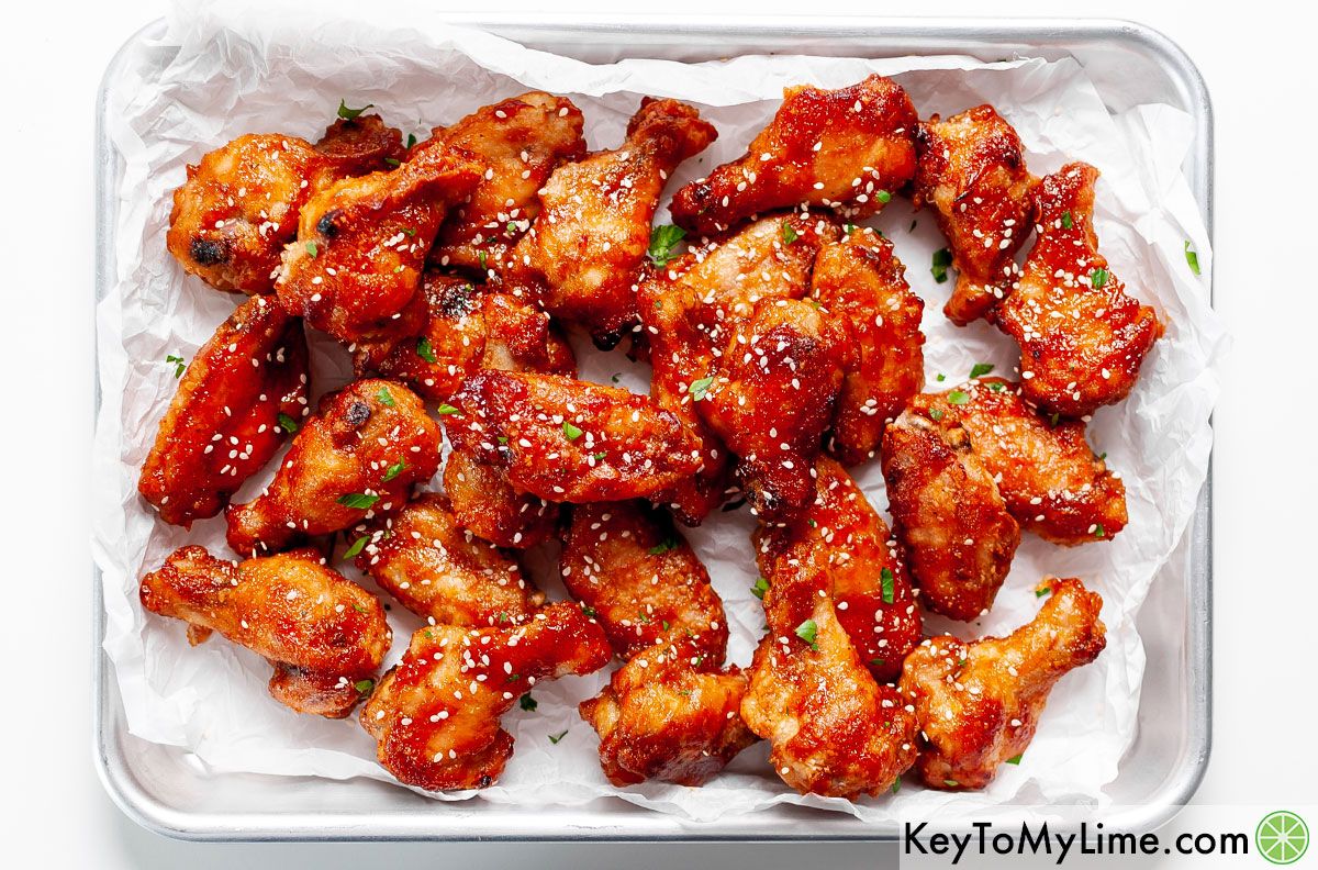 A tray of sweet and sour chicken wings.