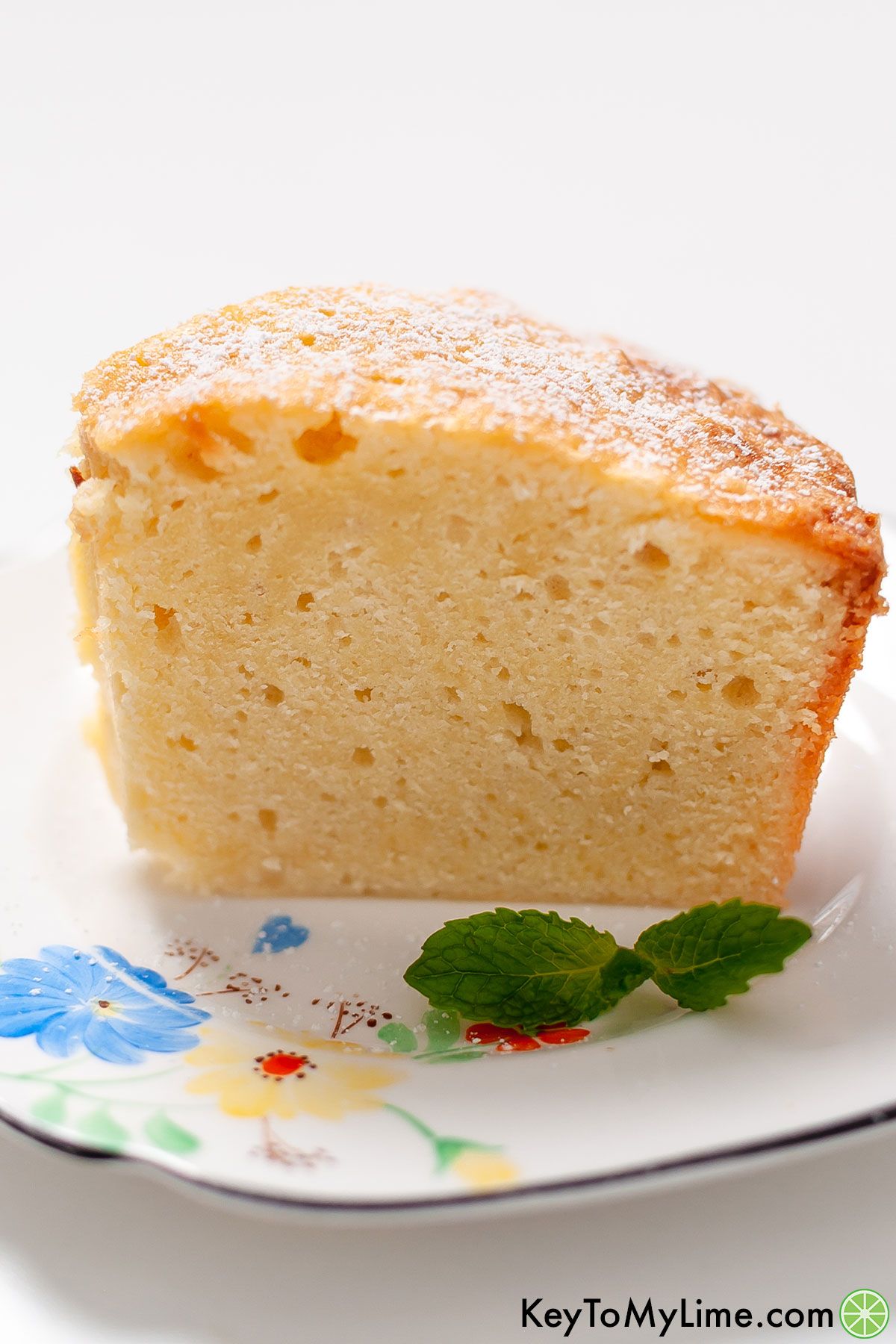 A side image of a slice of whipping cream pound cake.