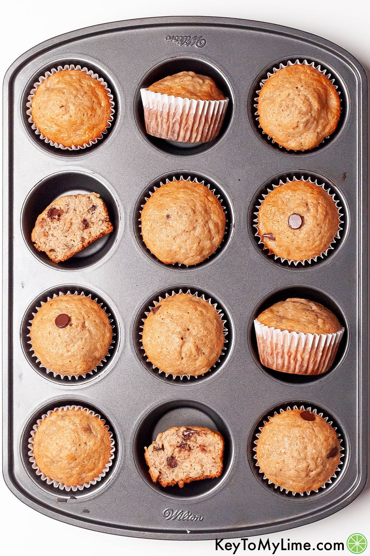 Bisquick banana muffins fresh out of the oven in a muffin tin..