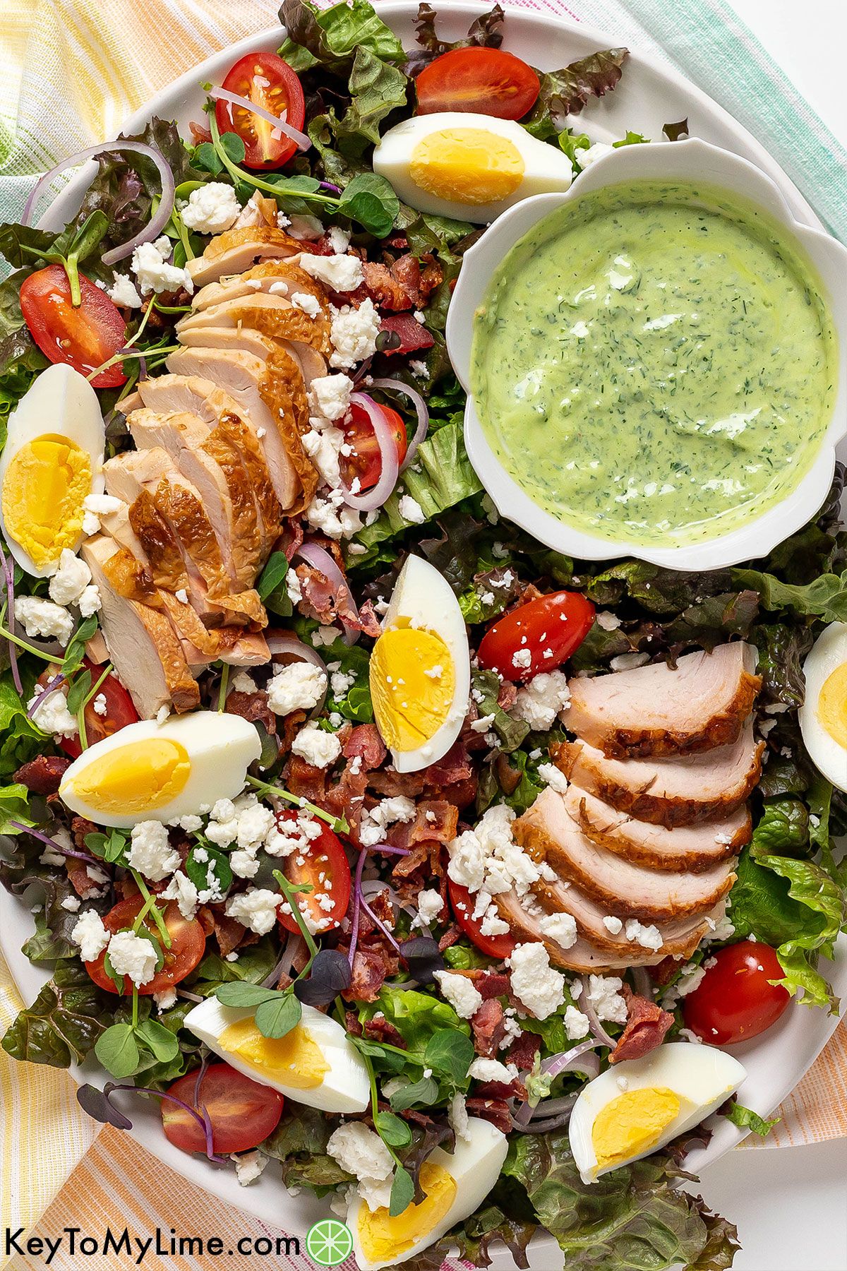 The best Green Goddess Cobb Salad on a platter.