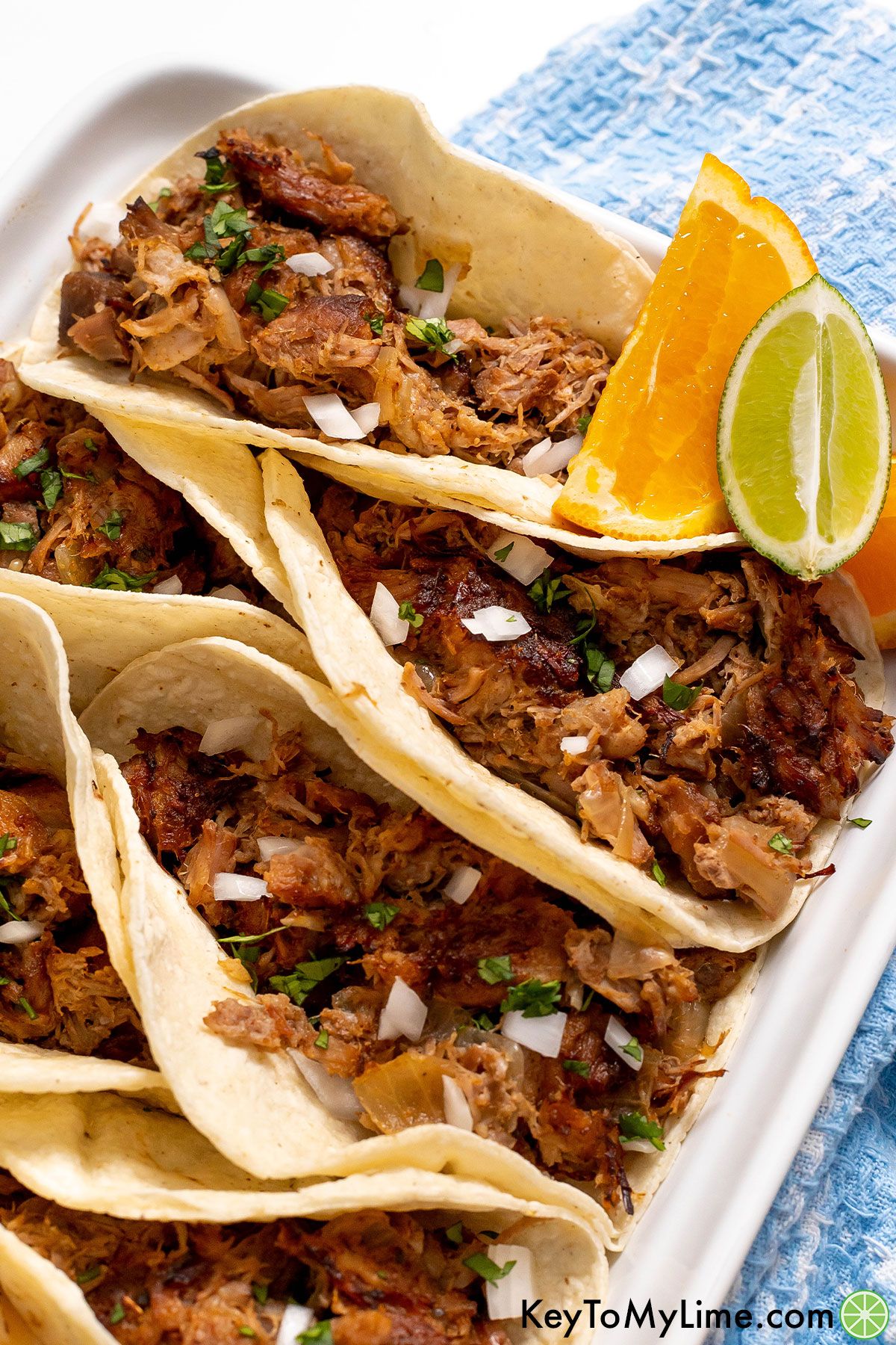 The best ever crispy carnitas served in soft taco shells.