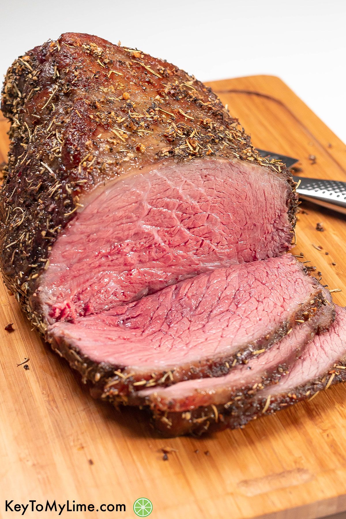 A beautiful perfectly cooked roast showing the inside texture.