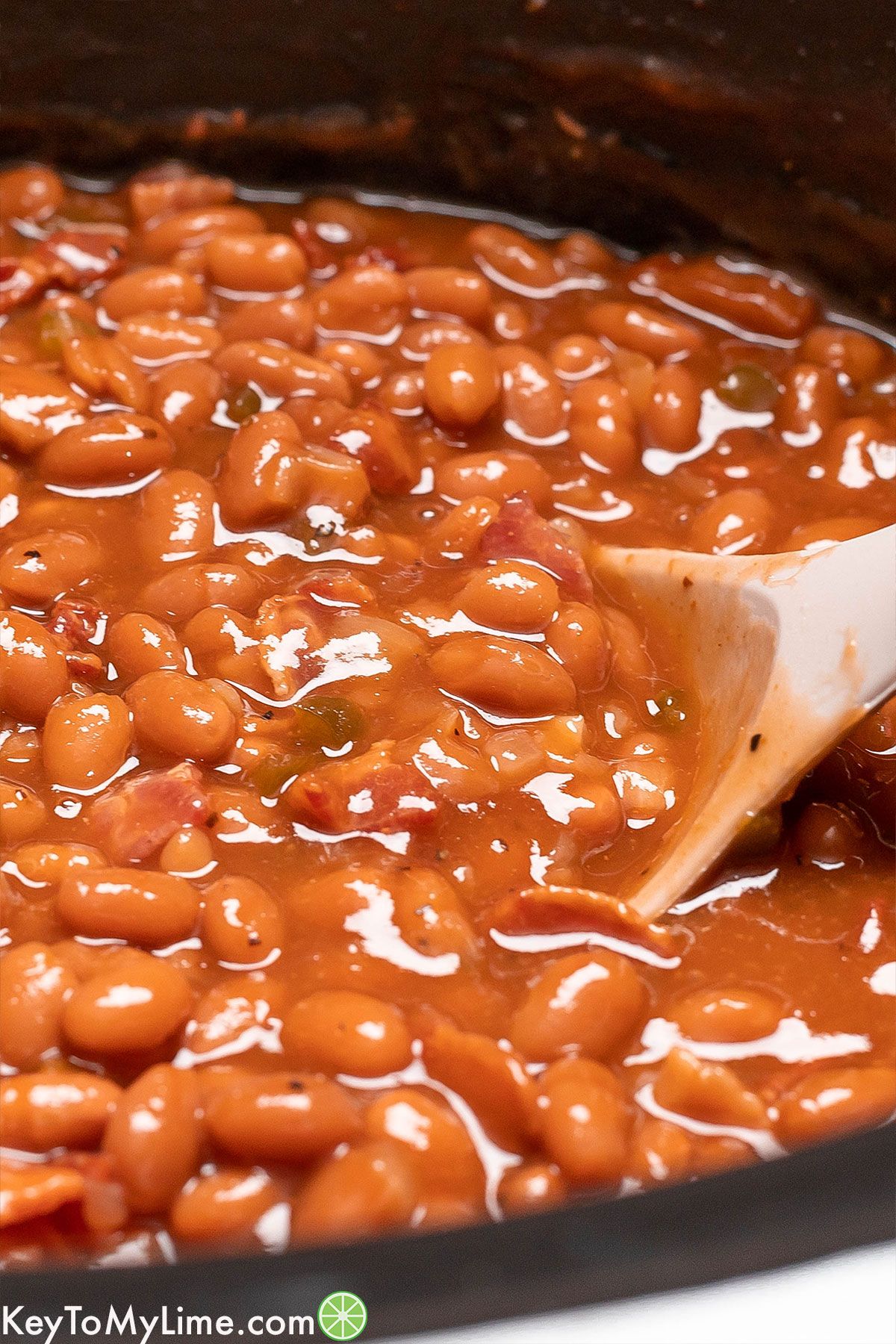 A close up image showing the texture of the baked beans.