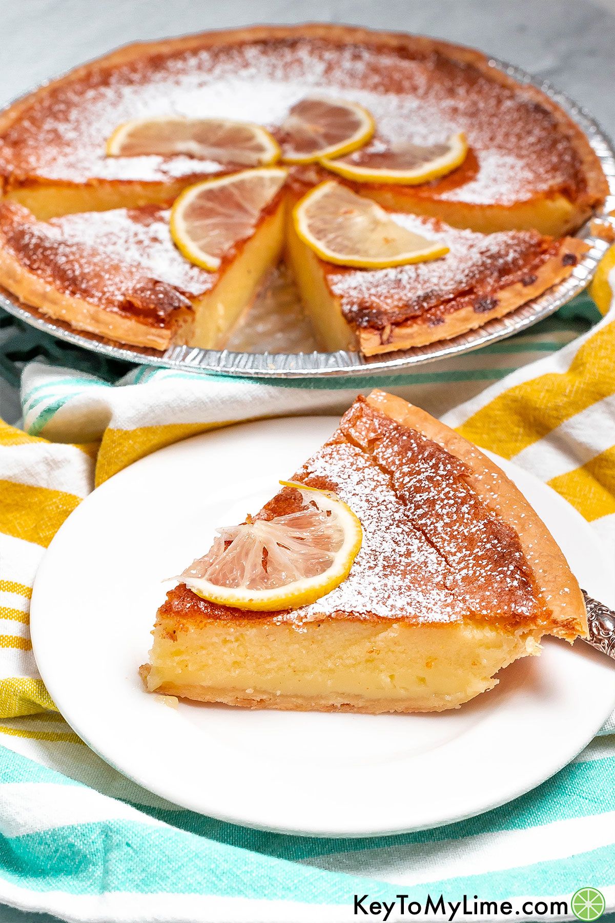 A single serving of buttermilk pie on a small white serving plate.