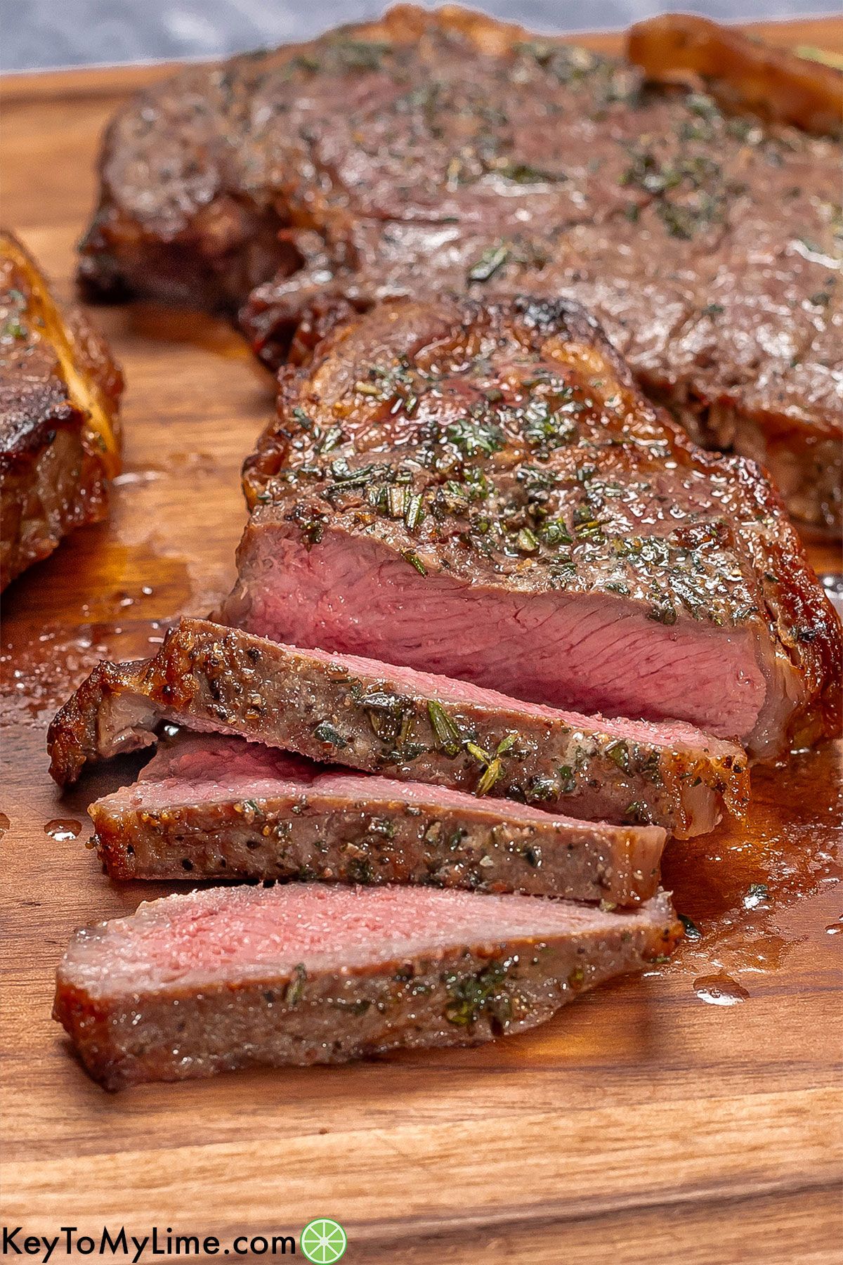 A side shot image of a sliced steak showing the inside texture.