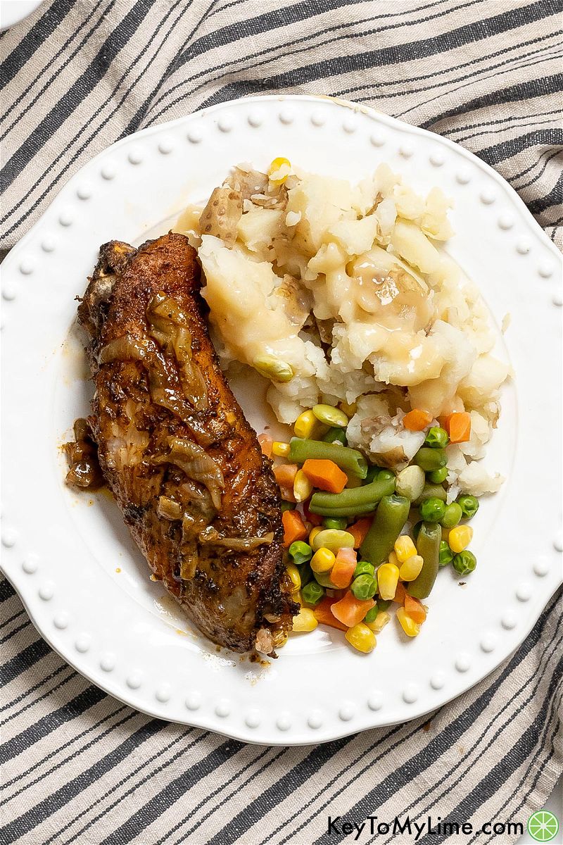 https://cf8480cb.flyingcdn.com/wp-content/uploads/2023/11/Plated-baked-turkey-wing-dinner-mixed-vegetables-and-gravy-on-potatoes.jpg?width=800